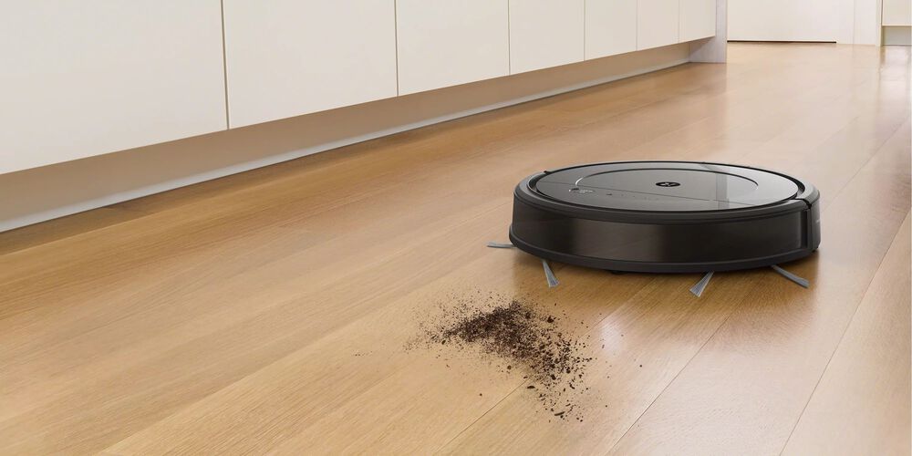 A Roomba in a kitchen